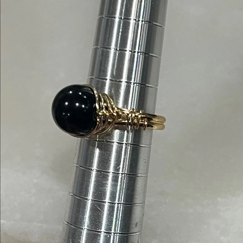 Elegant Gold and Black Stone Ring